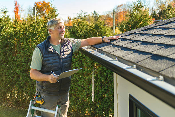 Professional Hail Damage Roof Repair technician working in Essig, MN
